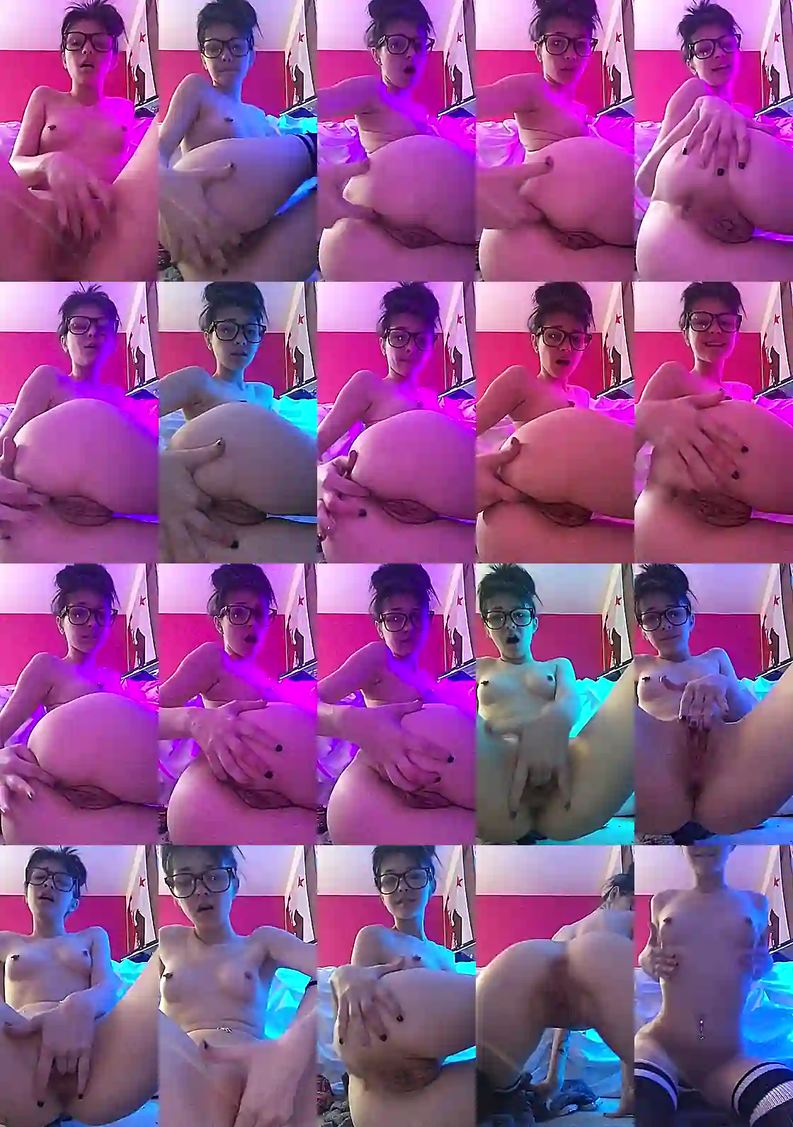 Young naked girl in glasses jerks anus with finger in front of computer monitor light